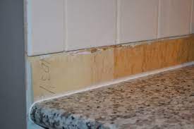 I am considering installing a tile backsplash in place of the current laminate one to update the house for resale. The Next Step Backsplash