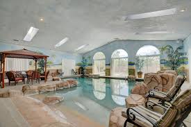 The Perfect Getaway Home This Helendale Property Features 2 000 Square Feet Of Enclosed Indoor Pool Area With A Kitchen A In 2020 Lounge Areas Cool Pools Indoor Pool