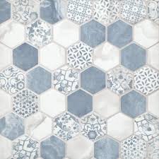 Blue beach themed bathroom features a marble top dual vanity paired with a blue iridescent tile backsplash lined with beveled mirrors. Pin On Master Bathroom