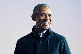 I didn't think too hard about it, but this woman was always in front of the camera, always smiling, always giving a speech. Barack Obama Memoir A Promised Land Reviewed