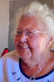 From 1982, a promotional postcard announcing the cassette release of "What  Should I Wear to the Revolution" by singer/songwriter and satirist Nancy  White. . Nancy was an influential topical songwriter in concert