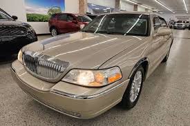 Image result for Light Ice Blue 2010 Town Car