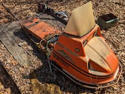 Image result for Orange 1973 Snowmobile