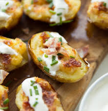 These Mini Twice Baked Potatoes Are Loaded With Bacon And Served With Sour Cream And Fresh Chives Say Hello To Your Ne Twice Baked Potatoes Food Loaded Potato