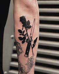 Rose And Butterfly Knife By Loz Mclean Tattooed On The Right Forearm Knife And Rose Tattoo Knife Tattoo Butterfly Knife Tattoo