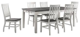 It features linen upholstery on the seat and back in a solid neutral finish for a look that complements nearly any color palette in your traditional aesthetic. Picket House Furnishings Jamison Two Tone Dining Set Transitional Dining Sets By Picket House Houzz