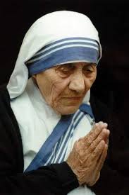Mother Teresa of Calcutta give until it's hurts and God loves acheeful  giver pray for us