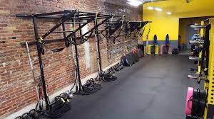 Wall Functional Training Station With Dual Tiered Pull Up Bar Sections Suspension Personal Training Studio Design Personal Training Studio Gym Design Interior