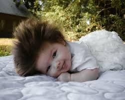 She seems to like it but it's making her make the funniest faces. Louisiana S Big Hair Baby Areea John Home Facebook