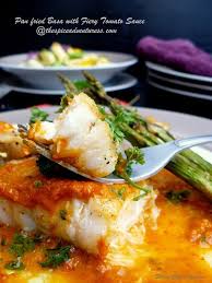 Pan Fried Basa With Fiery Tomato Sauce And Grilled Asparagus Basa Fillet Recipes Basa Fish Recipes Grilled Asparagus Recipes