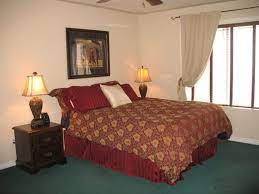 The Best Paint Colours To Update Forest Green Green Carpet Bedroom Green Living Room Decor Green Carpet