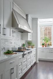 white and gray marble staggered tiles