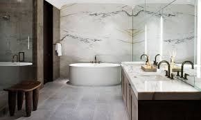 Marble imported from carrara, italy, is not only elegant it's beautiful in almost any shape or marble tile chair rail and baseboards are additional ornaments that add to any layout. Sophisticated Bathroom Designs That Use Marble To Stay Trendy