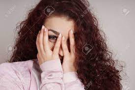 Shop our selection of face scarfs and grab your favorite today! Shy Young Woman Covering Face With Hands And Peeking Through Stock Photo Picture And Royalty Free Image Image 50954527