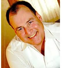 JOHN E. "JOHNNY" URBAN