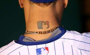 Ednel javier báez, nicknamed el mago, is a puerto rican professional baseball shortstop for the chicago cubs of major league baseball. Bleacher Nation Ar Twitter The Mlb Logo Has A Picture Of Javy Baez Tattooed On Its Neck