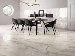 This Porcelain Tile Floor Gives The Upscale Look Of Marble Without The Coat Or The Concern Of Living Room Design Inspiration Tile Trends Modern Interior Design