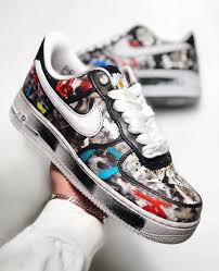 This pair essentially flips the color blocking of the original, featuring a black swoosh on a white leather upper, its top layer designed to wear away. Worn The Nike Air Force 1 G Dragon Peaceminusone Para Noise Is Available Nikeairforce1 Wethenew Nike Shoes Air Force Nike Custom Nike Shoes