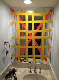 After the mirror is off the wall there may be adhesive and glue gunk under the mirror stuck to the wall that you want to remove. What Is A Good Technique To Remove A Glued In Mirror Without Access To Its Edges Home Improvement Stack Exchange