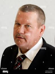 Robert Conroy, father of Jeffrey Conroy, leaves the courtroom in Riverhead,  N.Y., Thursday, March 18, 2010. Opening statements were expected Thursday  in the murder trial of teenager Jeffrey Conroy, accused of fatally