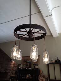 Steel Wagon Wheel Chandelier By Gergenstudio On Etsy 350 00 Wagon Wheel Chandelier Rustic Chandelier Boho Bedroom Decor