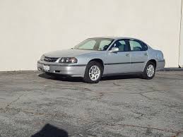 Image result for Medium Green Pearl 2003 Impala