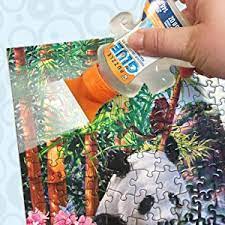 Once the puzzle is finished, though, don't waste the effort. Amazon Com Masterpieces Elmer S Puzzle Glue 5 Ounce Toys Games