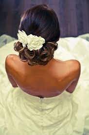Wedding Updo With Flowers Black Wedding Hairstyles Hair Styles Wedding Hairstyles