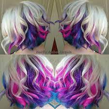 For the latter, go with a mix of medium toned pink and extra light blonde tones worked into a medium length cut. Icy Blonde With Pink Purple And Blue Peekaboos Hair By Amber Jacquin Pink Blonde Hair Peekaboo Hair Cool Hair Color
