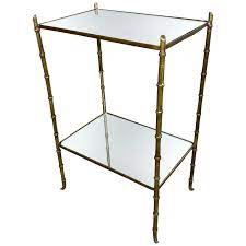 A cast iron faux bamboo side table. Faux Bamboo Brass And Mirror Side Table By Maison Bagues France 1950s For Sale At 1stdibs