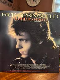 From a Dutch TV show in 1985 is "Holding Back the Years" (Picture Book  1985). 💖🥰🫶