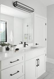 This ensures they work well with almost any style of bathroom, though they're most popular with contemporary designs. Bright White Bathroom Devon Grace Interiors White Vanity Bathroom White Bathroom Cabinets White Bathroom