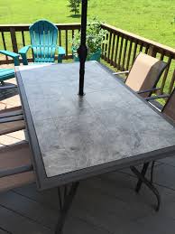 The Glass Table Top Shattered In 1 000 Pieces When The Breeze Caught The Umbrella Replaced It With A Plywood Patio Table Redo Patio Table Top Diy Patio Table