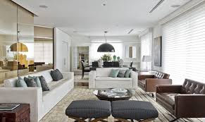 Inspiration for a traditional formal and grey and cream living room in london with beige walls, light hardwood flooring, a standard fireplace, a stone fireplace surround. Apartment Bronze Curated Contemporary Home With Pops Of Bright Color