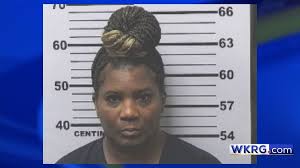 Mobile woman accused of robbing two men working