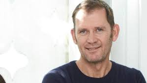 Designer Andrea Moore bankrupt, now real estate agent