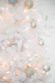 Add fake winterberries and silver bells to complete a traditional tree. Secrets Tips To Decorate A White Christmas Tree Shabbyfufu Com