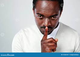 2,119 Young Man Finger Over Lips Stock Photos
