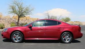 Image result for Medium Red 2004 Pontiac