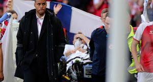 Christian eriksen er vågen og er til yderligere undersøgelser på rigshospitalet. Christian Eriksen Stable In Hospital After Collapsing During Denmark Game