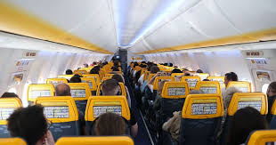Close-up of a Ryanair aircraft engine and fuselage at the airport, symbolizing the airline&rsquo;s low-cost services and flexible flight change options