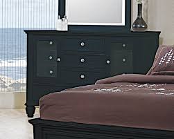 It is an island of stark contrasts; Sandy Beach 11 Drawer Dresser Black Coaster Fine Furniture