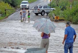 Torrential rain brings a river of mud to Tesuque; more precipitation is