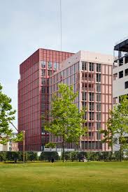 Duggan Morris Builds Office With Millennial Pink Exterior In King S Cross Duggan Morris Facade Architecture Design Architects London