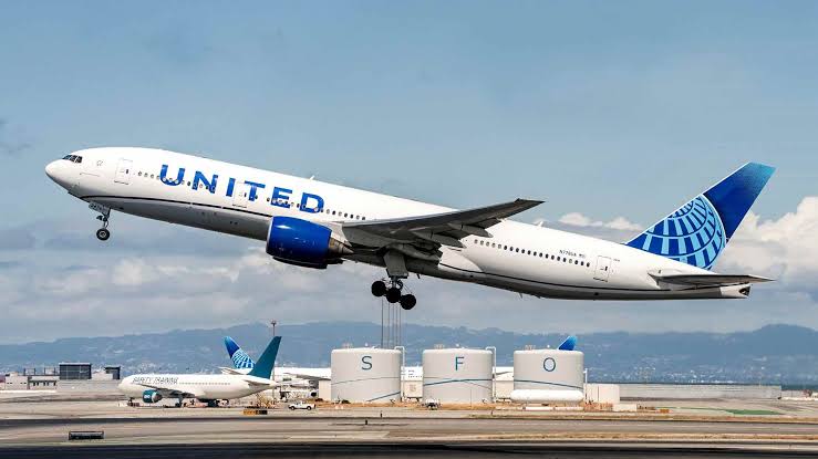 United Airlines raises its outlook as higher fares help offset $6 billion in fuel costs.