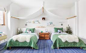 Modern small bedroom with two beds. 8 Twin Beds With Concealed Storage