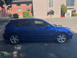 Image result for Electric Blue 2007 Mazda3