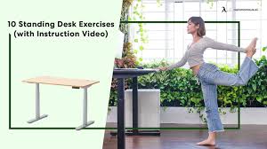 Doing Some Standing Desk Exercises Each Day Can Certainly Yield Many Benefits Ranging From Increased Produc In 2021 Standing Desk Exercises Desk Workout Quick Workout