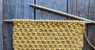 A knit band is a pretty common treatment. Double Moss Stitch Savlabot
