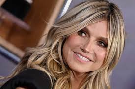 Heidi Klum in sheer lace dress